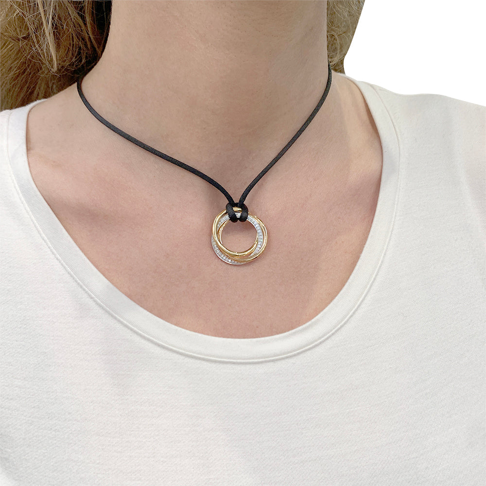 Cartier necklace, "Trinity", three golds, diamonds.