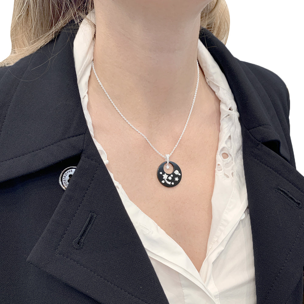 Chanel "Cosmique" necklace in white gold, ceramic, and diamonds.