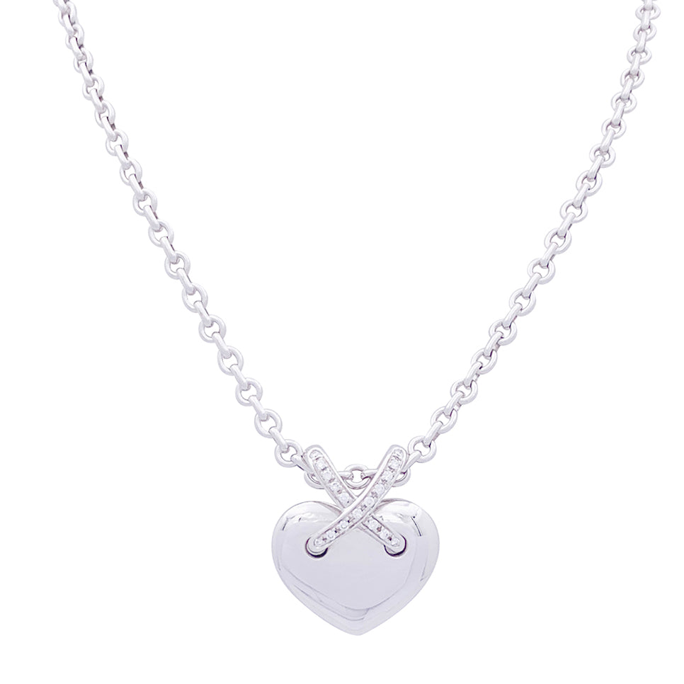 Collier Chaumet, "Coeur Liens", or blanc et diamants.