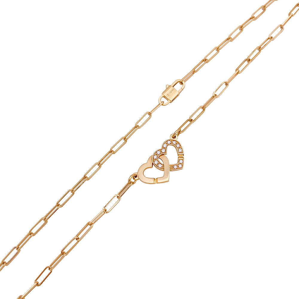 Dinh Van "Double Heart" necklace in rose gold and diamonds.