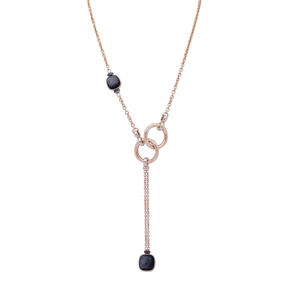 Collier Pomellato, "Nudo", or rose, obsidiennes, diamants noirs.