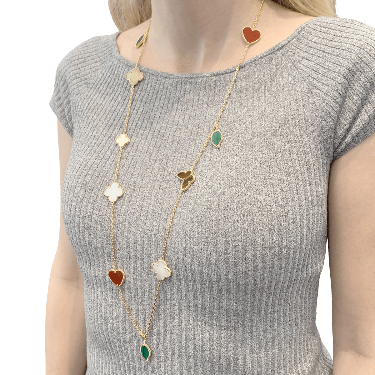 Collier - Sautoir Van Cleef & Arpels, "Lucky Alhambra", or jaune, cornaline, malachite, oeil de tigre, nacre. - Maison Eloe