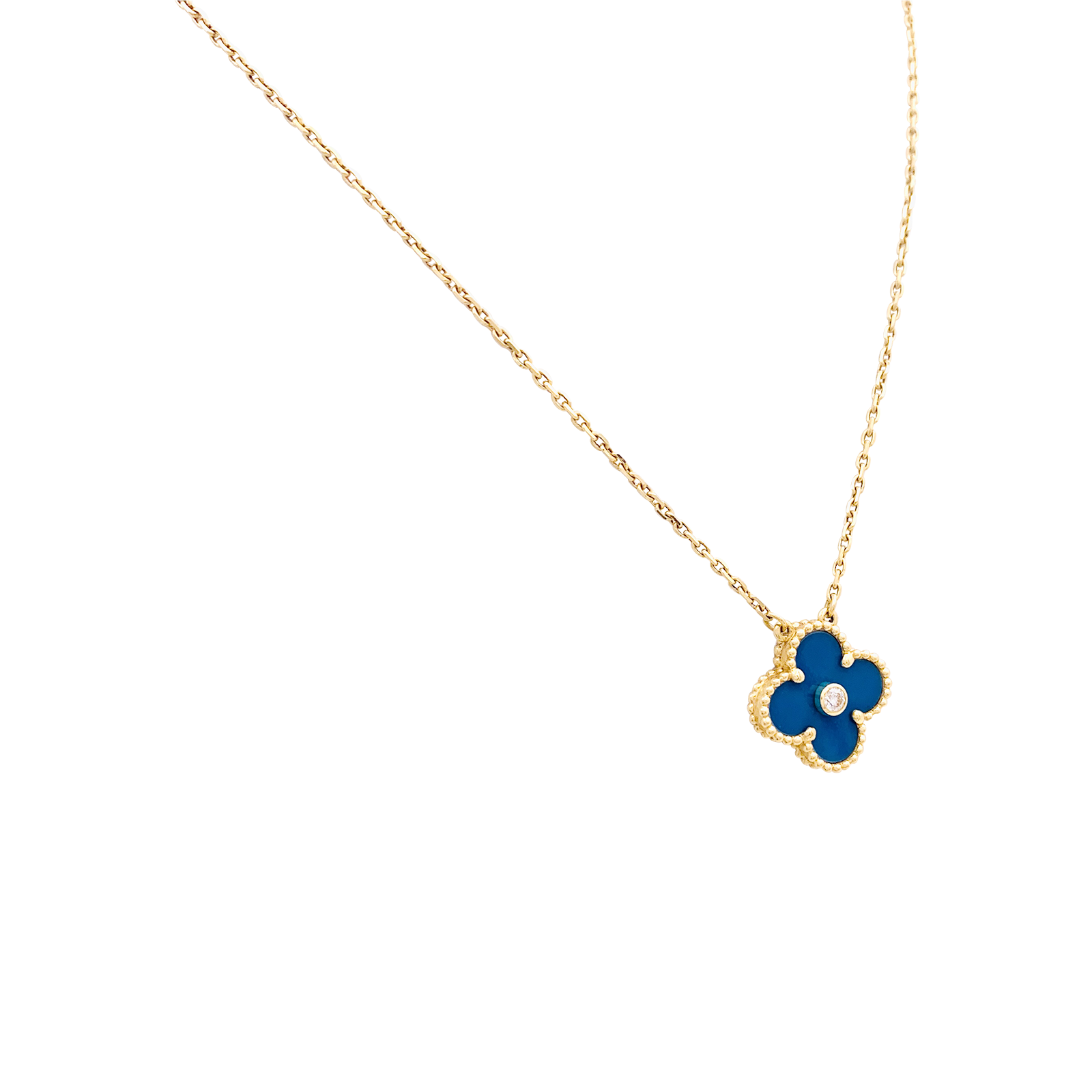 Van Cleef & Arpels "Alhambra" necklace in yellow gold, porcelain, and diamond.
