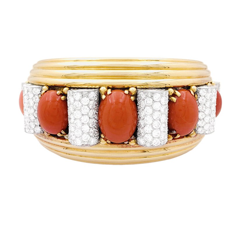 Important jonc attribué à René Boivin, platine, or jaune, corail et diamants. - Maison Eloe