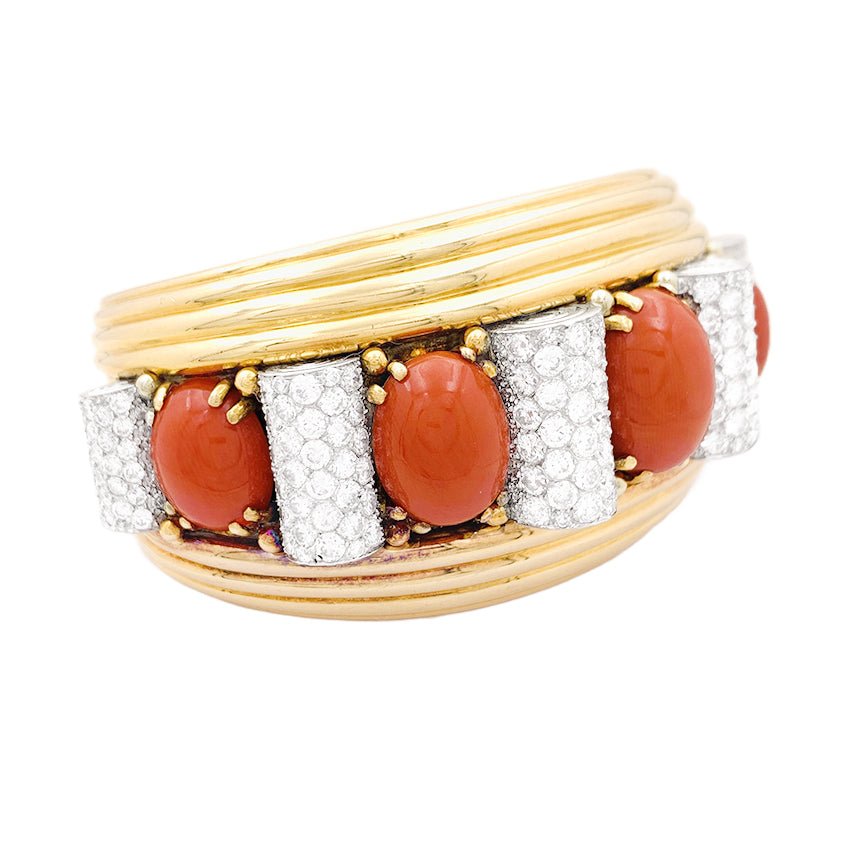 Important jonc attribué à René Boivin, platine, or jaune, corail et diamants. - Maison Eloe