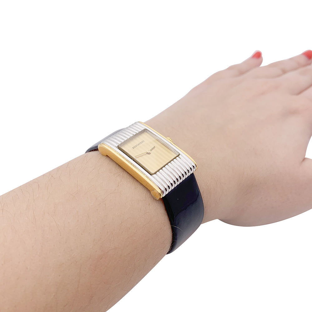 Boucheron watch, "Reflet", yellow gold, steel.