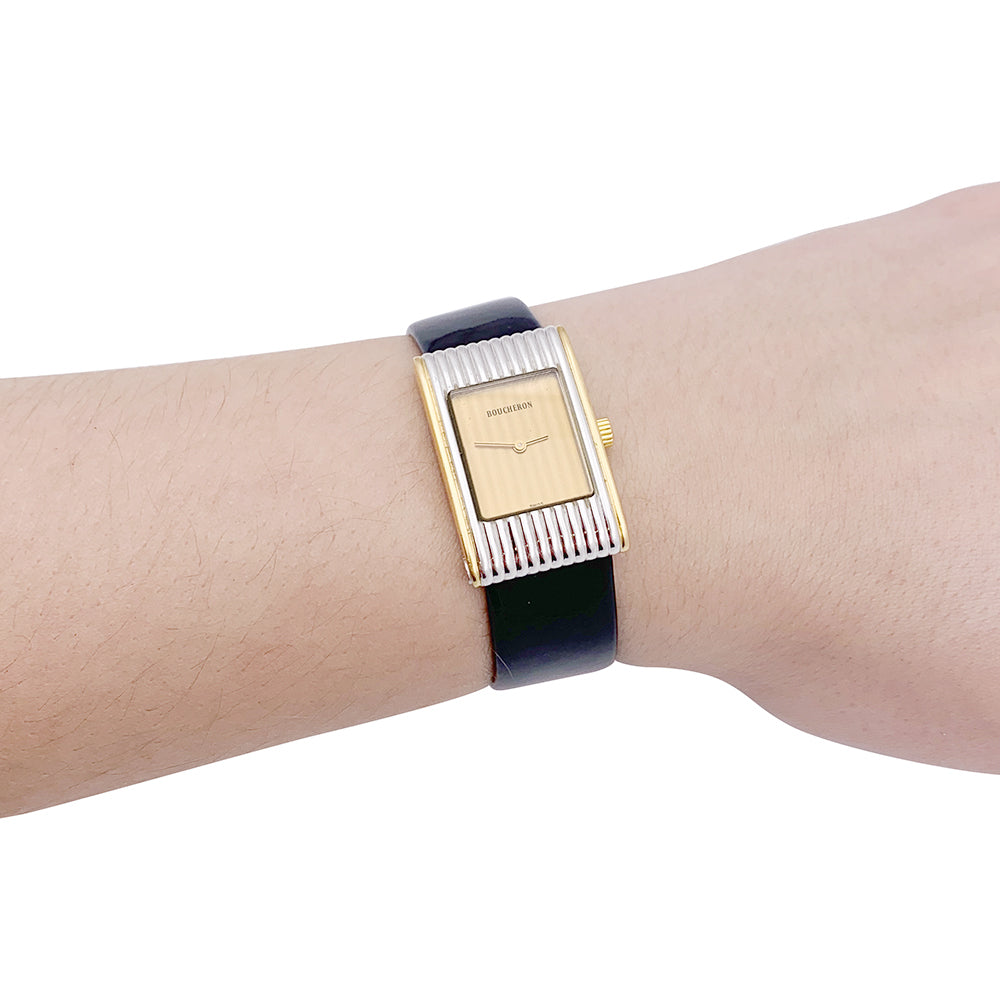 Boucheron watch, "Reflet", yellow gold, steel.