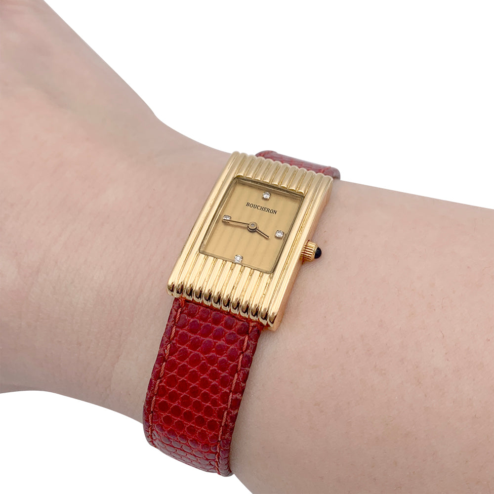 Boucheron watch, "Reflet", yellow gold, leather.
