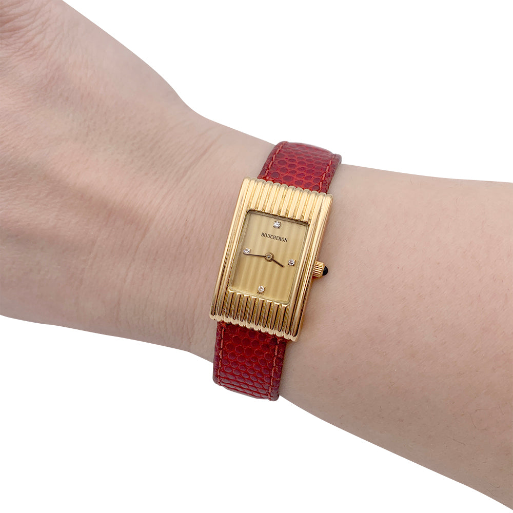 Boucheron watch, "Reflet", yellow gold, leather.