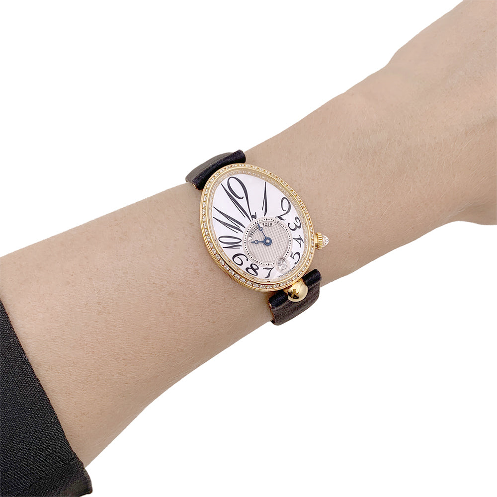 Breguet "Reine de Naples" watch in pink gold, diamonds, mother-of-pearl, satin.