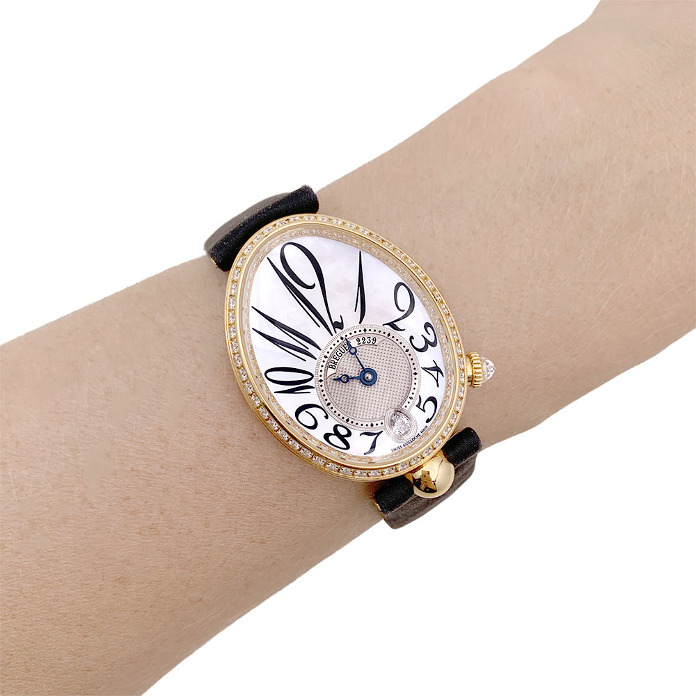 Breguet "Reine de Naples" watch in pink gold, diamonds, mother-of-pearl, satin.