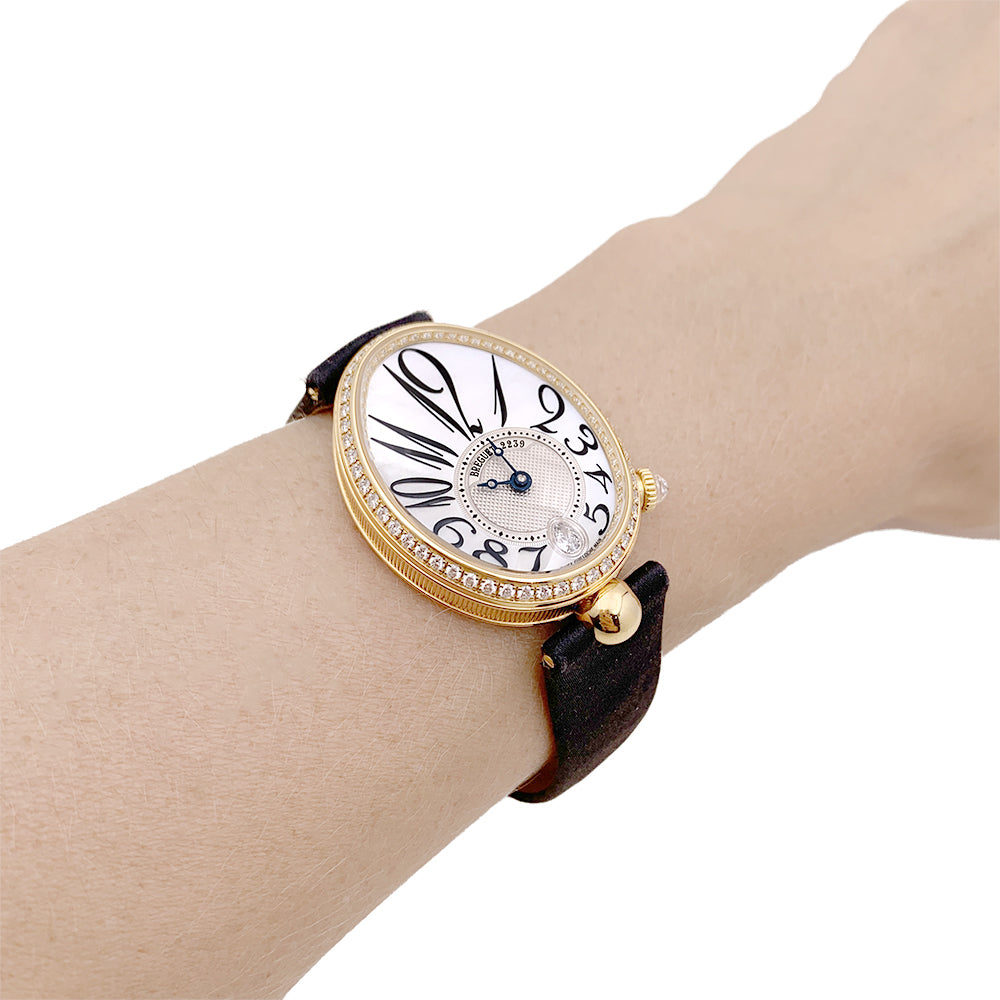 Breguet "Reine de Naples" watch in pink gold, diamonds, mother-of-pearl, satin.