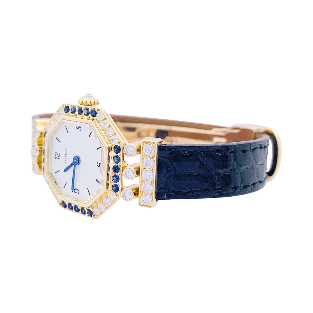 Cartier watch, "Andine", yellow gold, diamonds, sapphires.