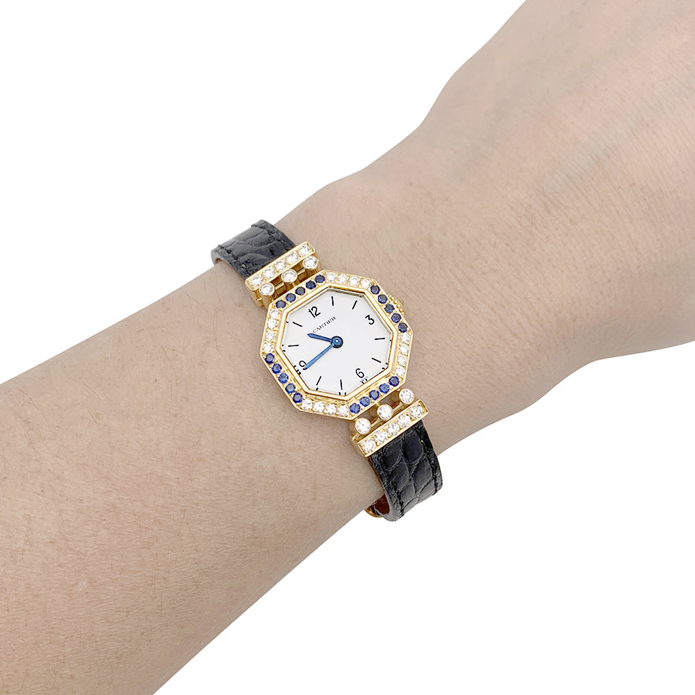 Cartier watch, "Andine", yellow gold, diamonds, sapphires.