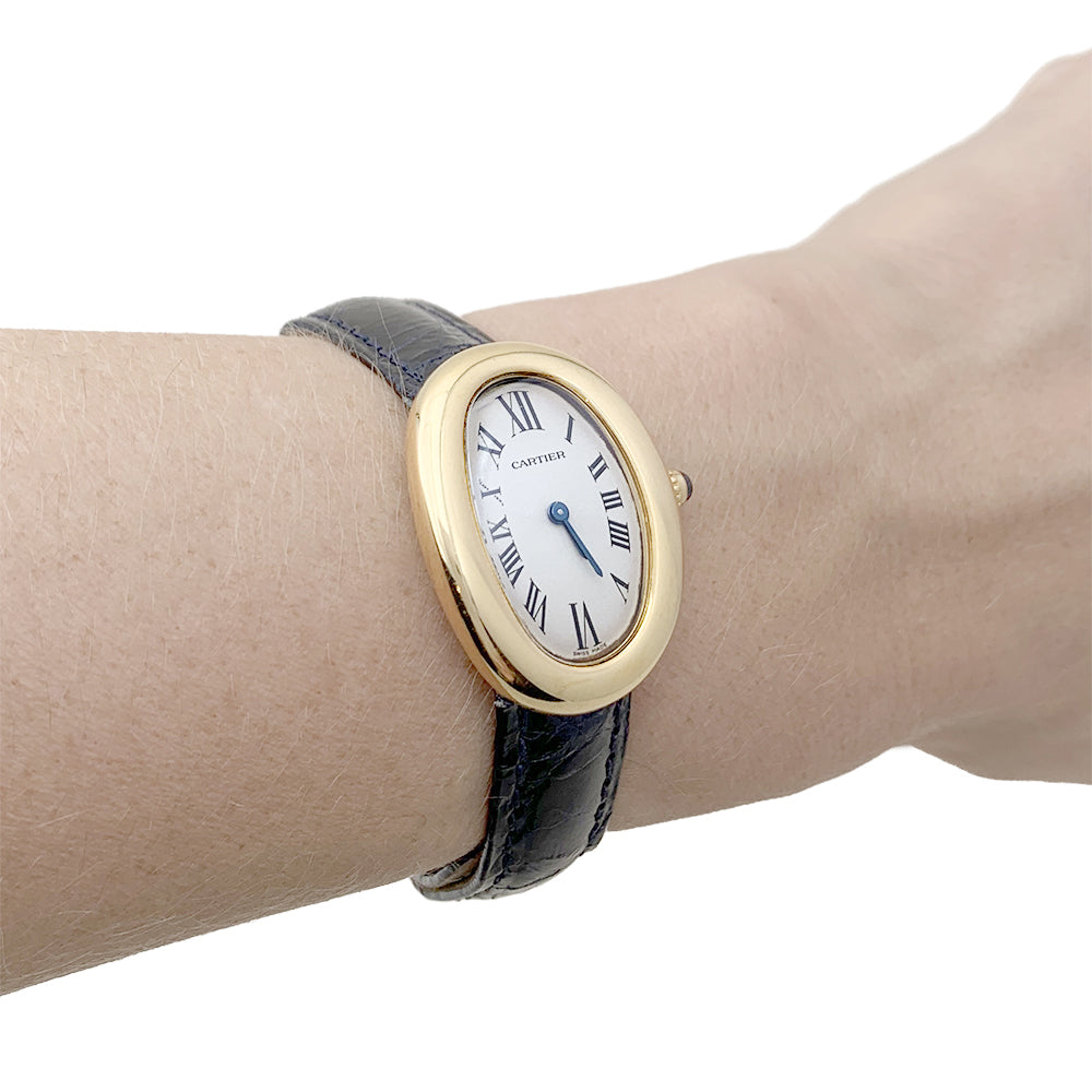 Cartier "Baignoire" watch in yellow gold.