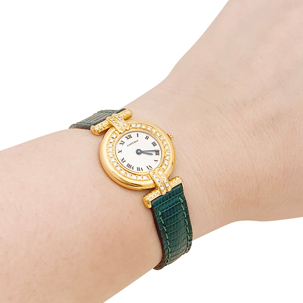 Cartier "Colisée" watch, yellow gold, diamonds, leather.