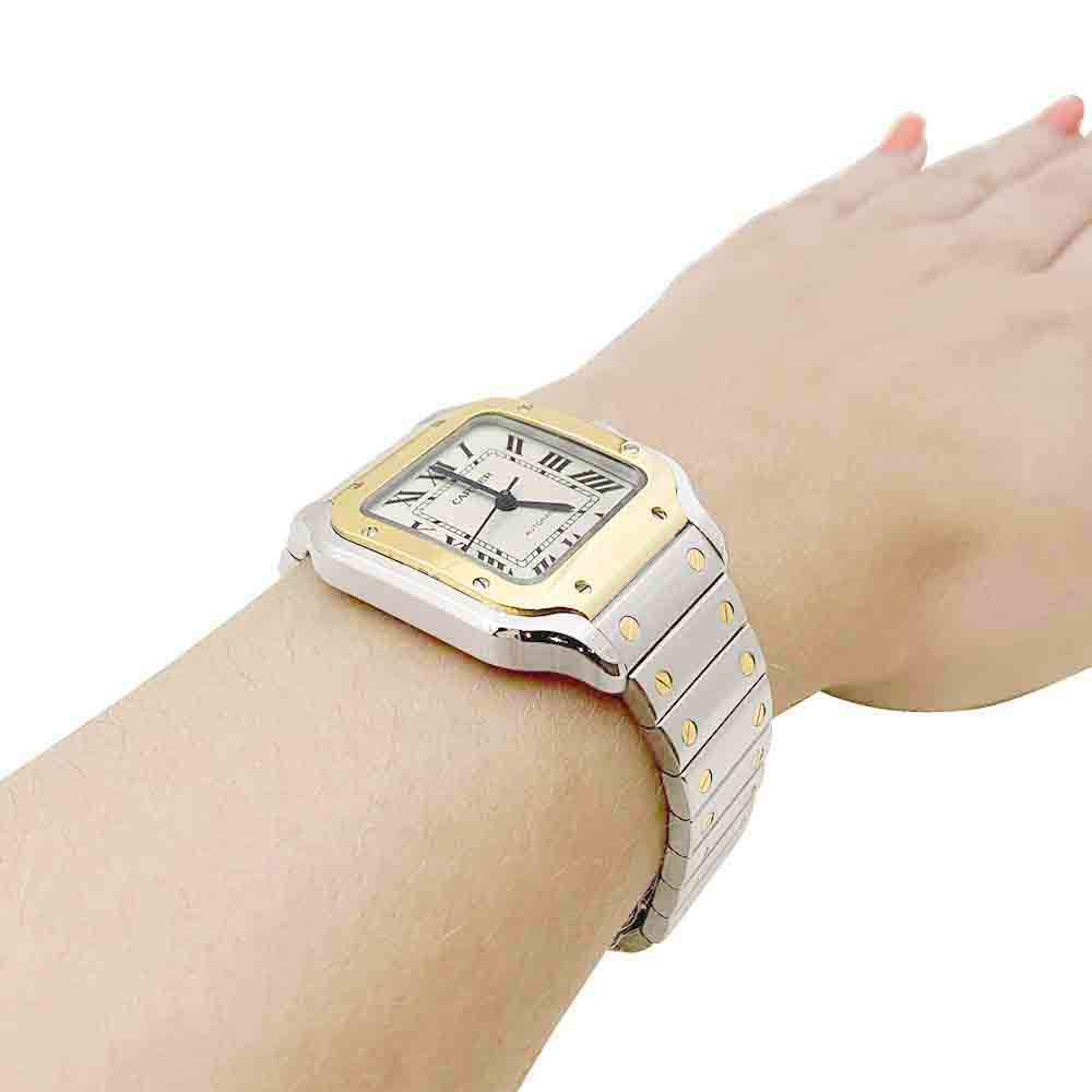Cartier "Santos" watch, gold and steel.
