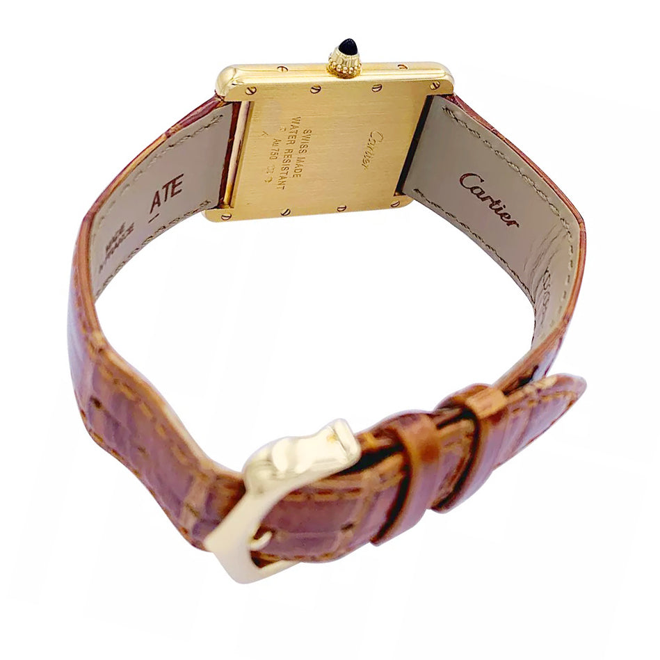 Cartier "Tank Louis Cartier" watch in yellow gold.