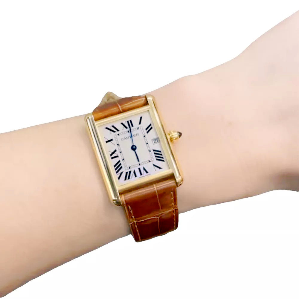 Cartier "Tank Louis Cartier" watch in yellow gold.