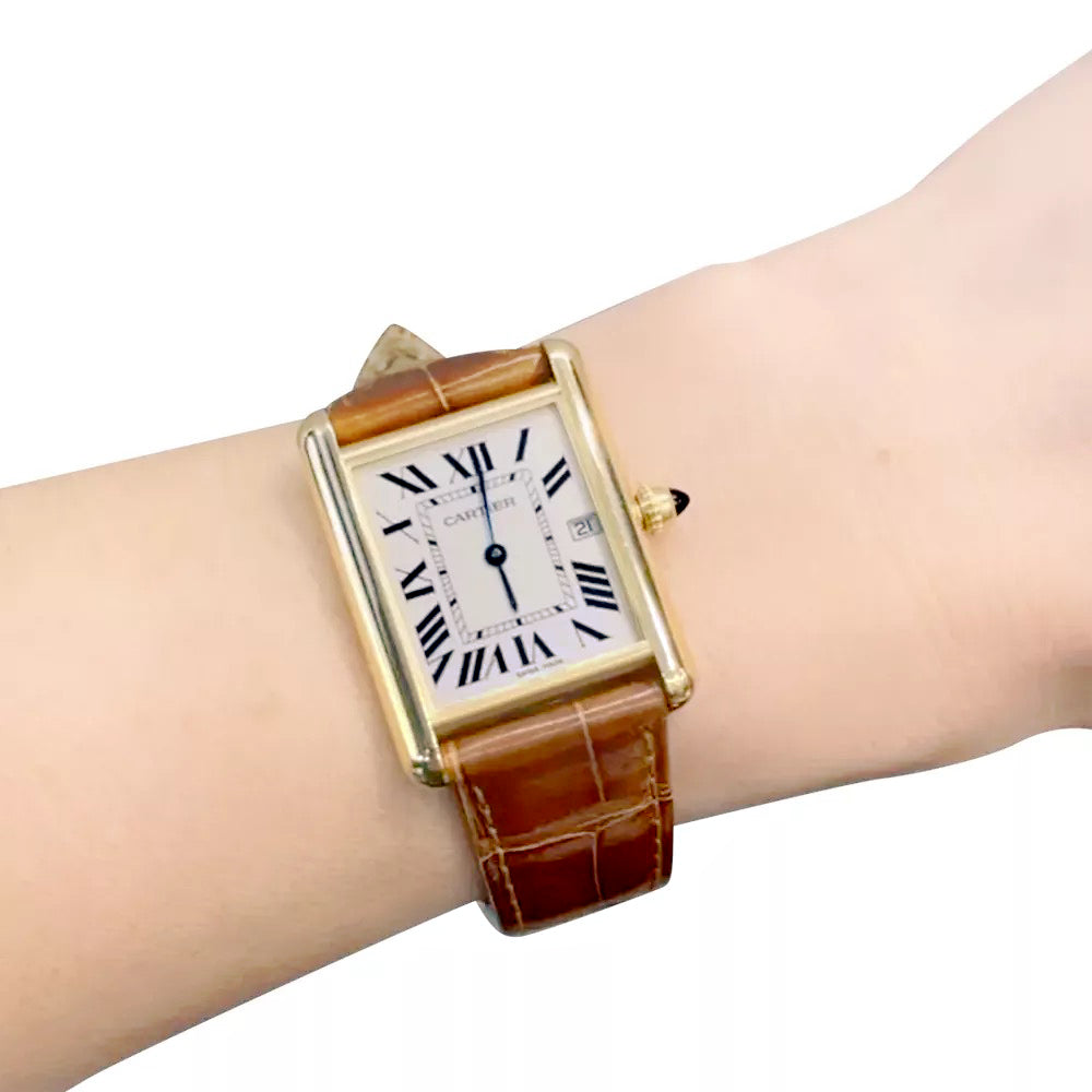 Cartier "Tank Louis Cartier" watch in yellow gold.