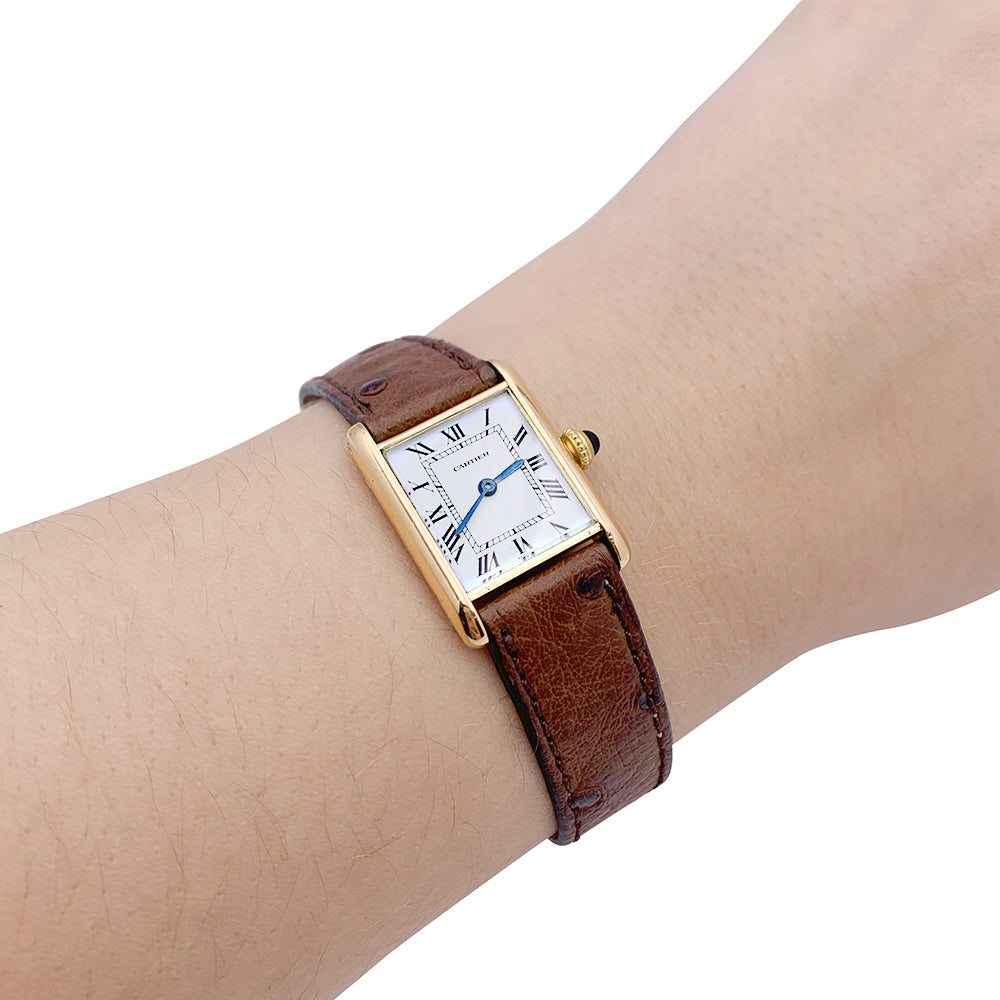 Cartier "Tank Louis Cartier" watch, yellow gold, leather.