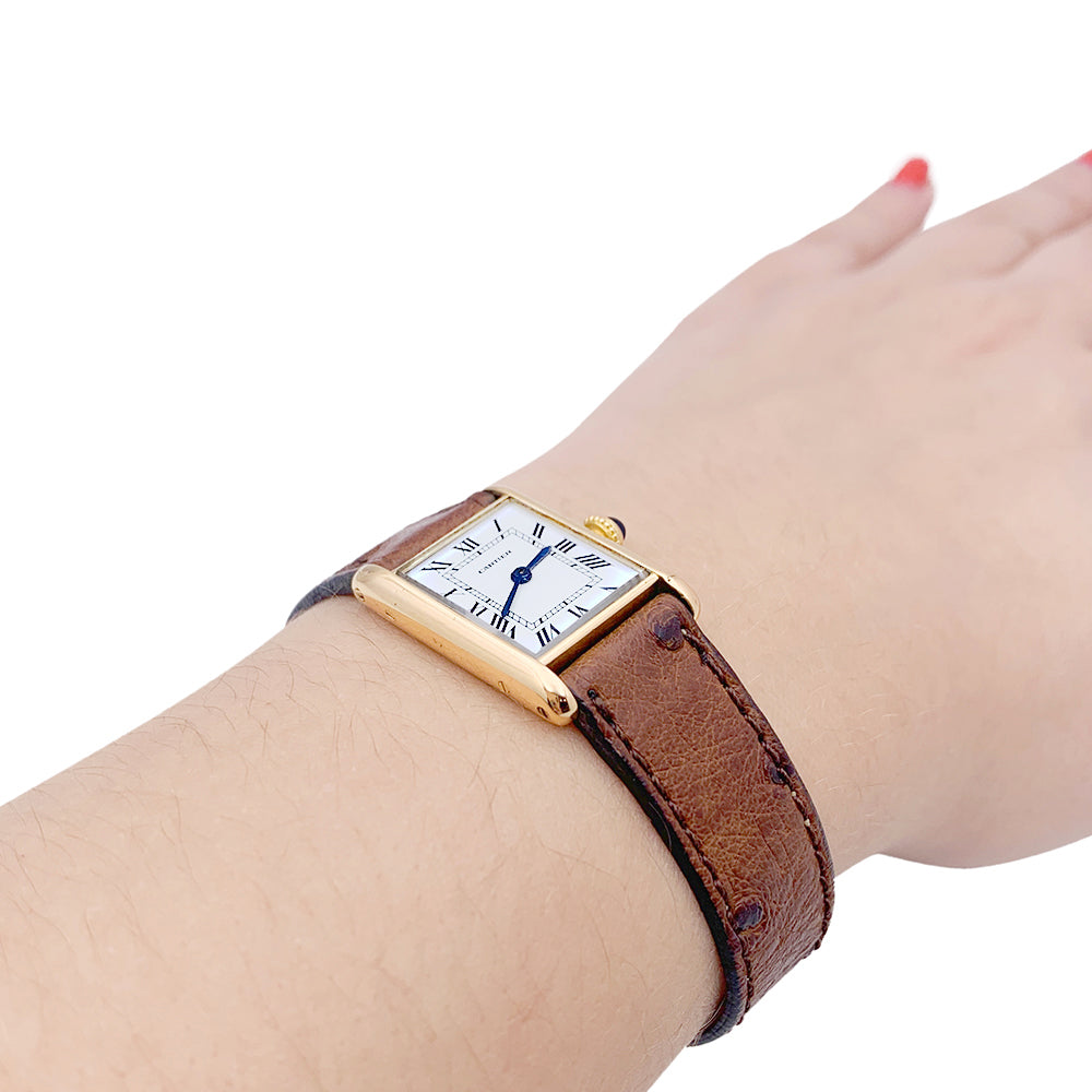 Cartier "Tank Louis Cartier" watch, yellow gold, leather.