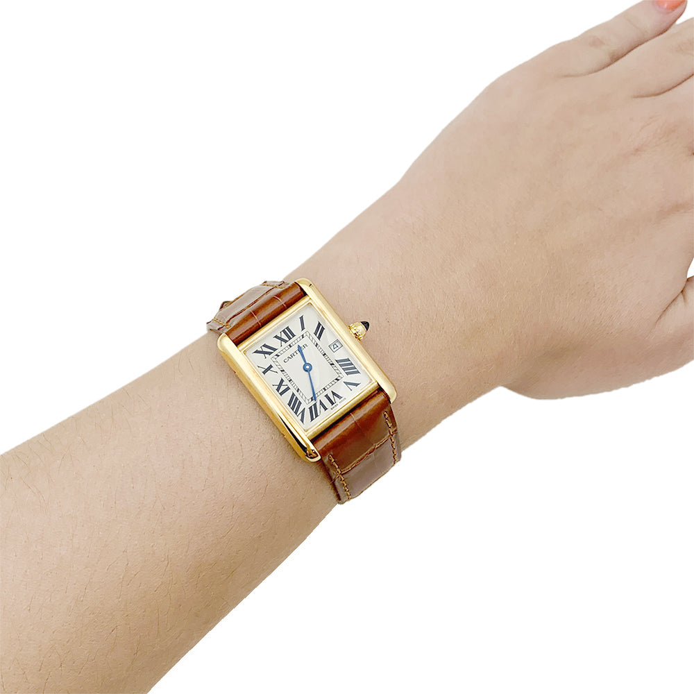Cartier "Tank Louis Cartier" watch, yellow gold, leather.