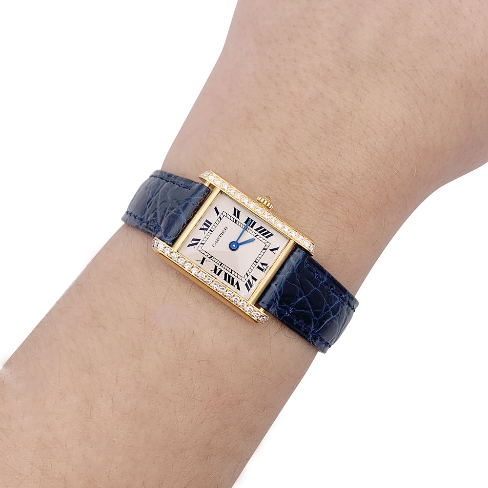 Cartier watch, "Tank Louis Cartier", yellow gold and diamonds.
