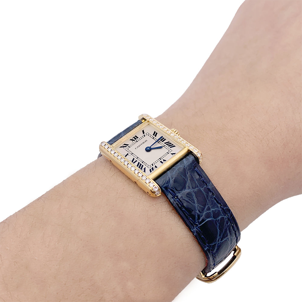 Cartier watch, "Tank Louis Cartier", yellow gold and diamonds.