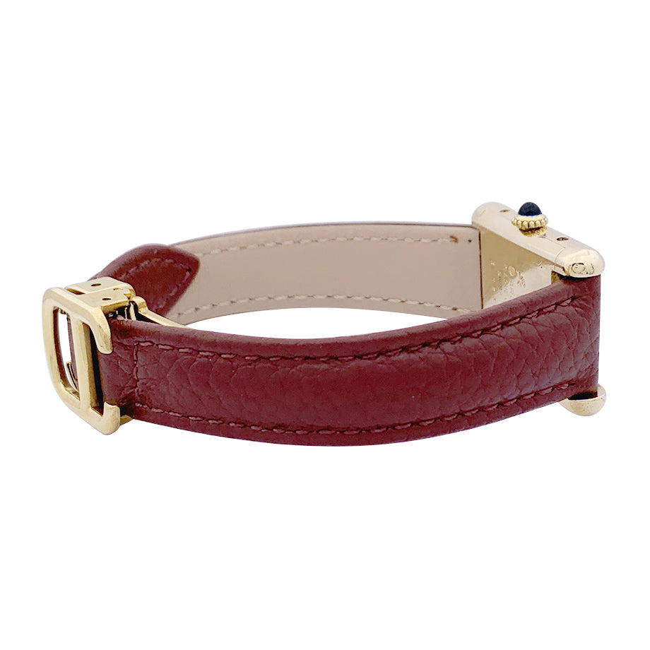 Cartier "Tank Must" watch, gold-plated silver, brown lacquered dial.