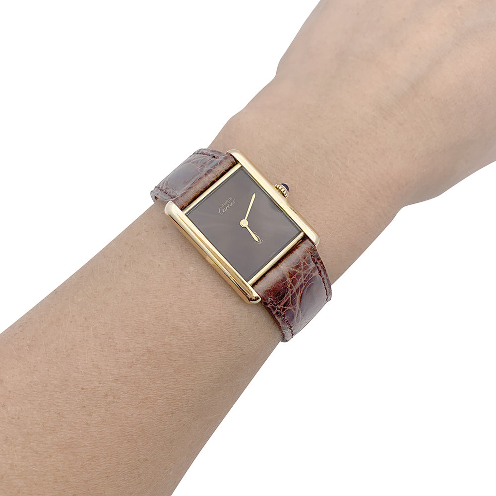Cartier "Tank Must" watch, gold-plated silver, brown lacquered dial.