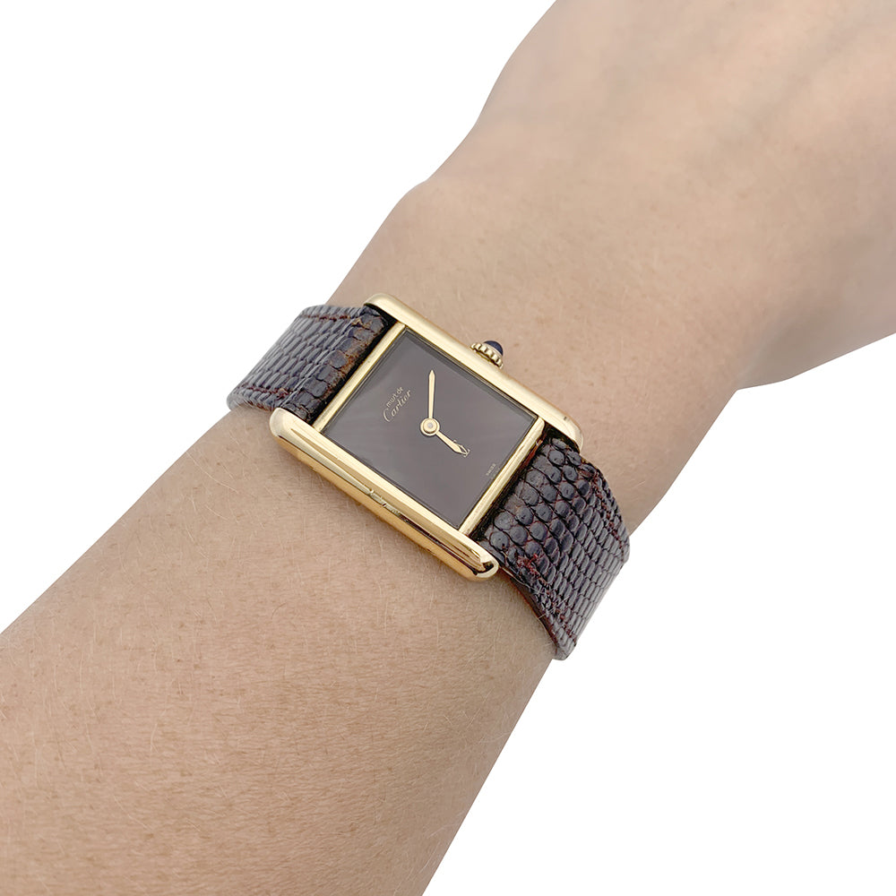 Cartier "Tank Must" watch, gold-plated silver, brown lacquered dial.