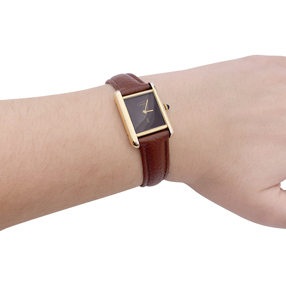 Cartier "Tank Must" watch, gold-plated silver, brown lacquered dial.