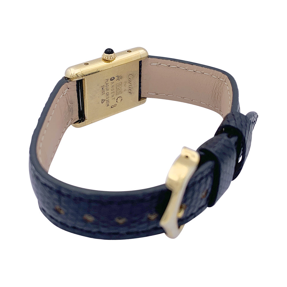 Cartier "Tank Must" watch, gold-plated silver, black lacquered dial.