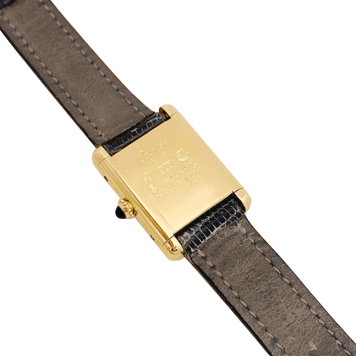 Montre Cartier "Tank Must" argent plaqué or, cadran laqué noir. - Maison Eloe