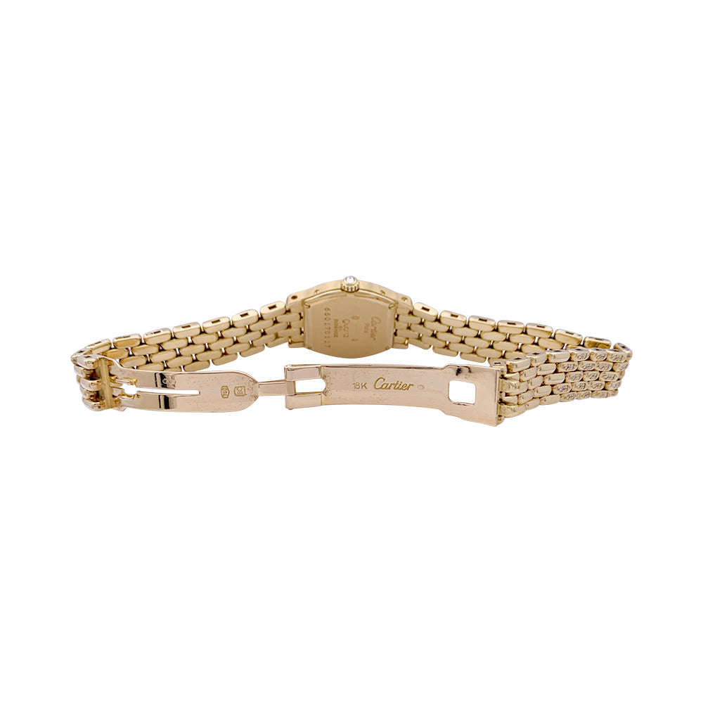 Cartier "Turtle" watch in yellow gold, diamonds, mother-of-pearl.