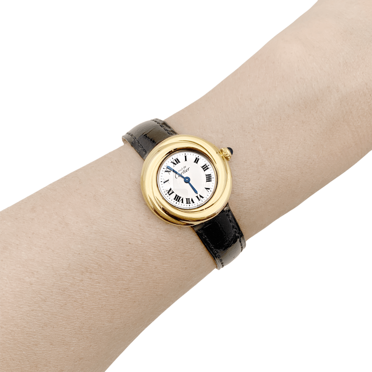 Montre Cartier, "Trinity Must", argent plaqué or, cuir. - Maison Eloe