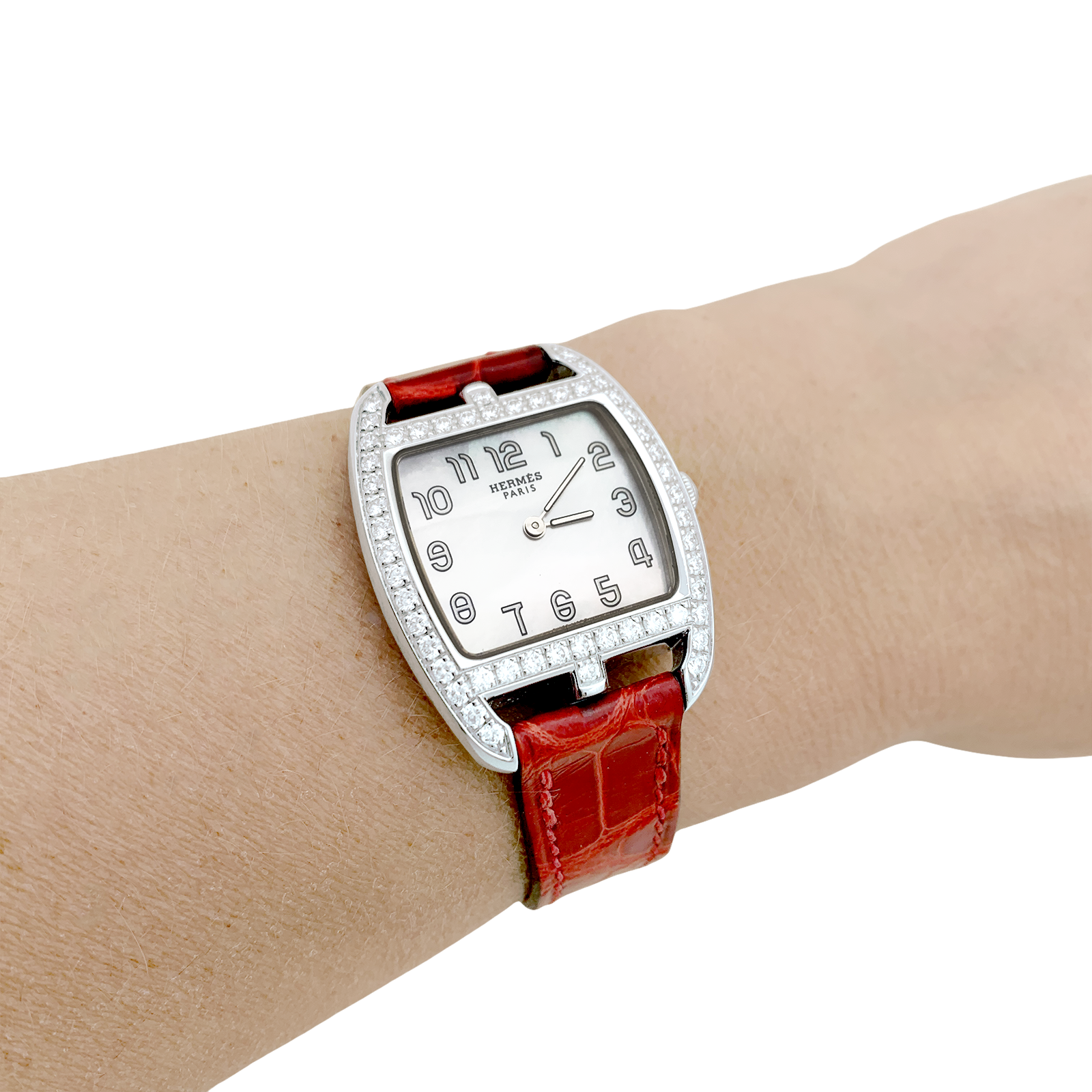 Hermès watch, "Cape Cod Tonneau", in steel and diamonds on leather.