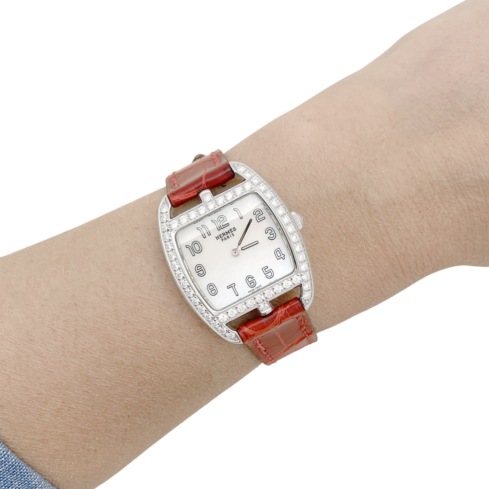 Hermès watch, "Cape Cod Tonneau", in steel and diamonds on leather.