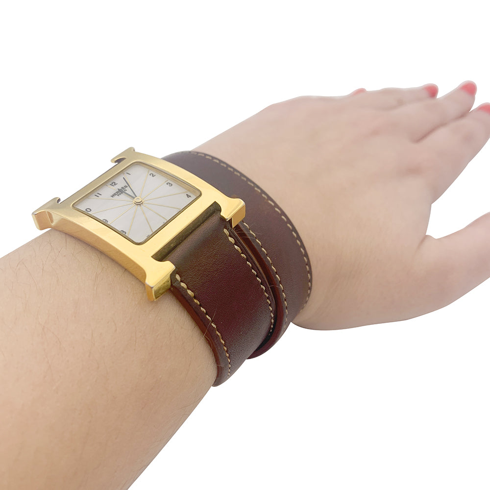 Hermès watch, "Heure H", gold plated, steel on leather.