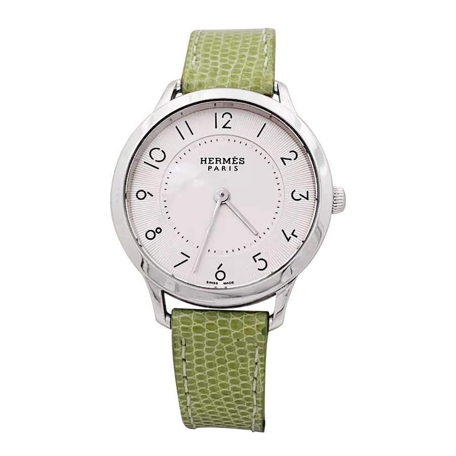 Montre Hermès, "Slim", acier. - Maison Eloe