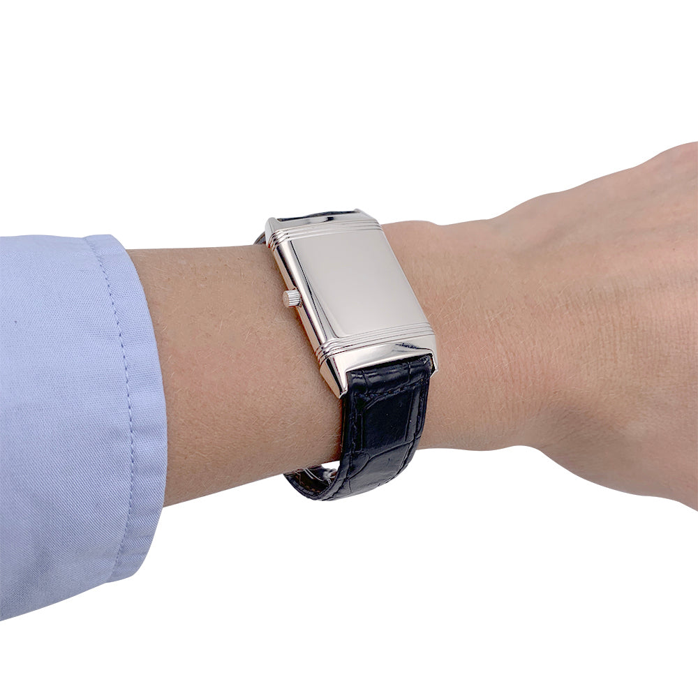 Montre Jaeger Lecoultre, "Reverso", or blanc, acier, cuir.