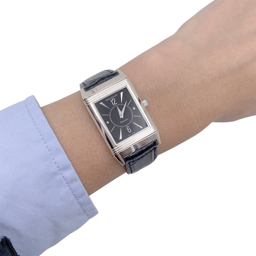 Montre Jaeger Lecoultre, "Reverso", or blanc, acier, cuir.