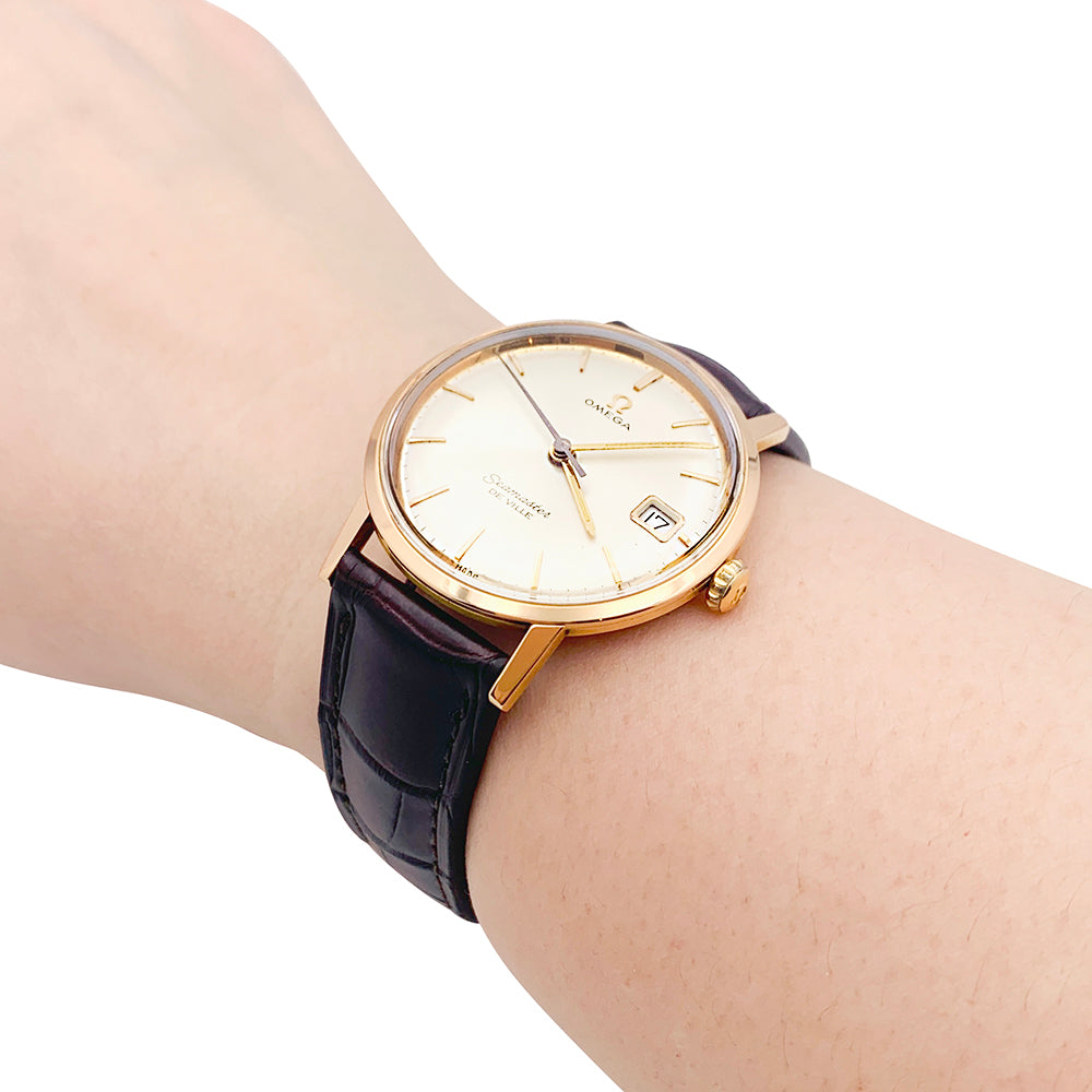 Omega watch, "Seamaster De Ville", rose gold, leather.