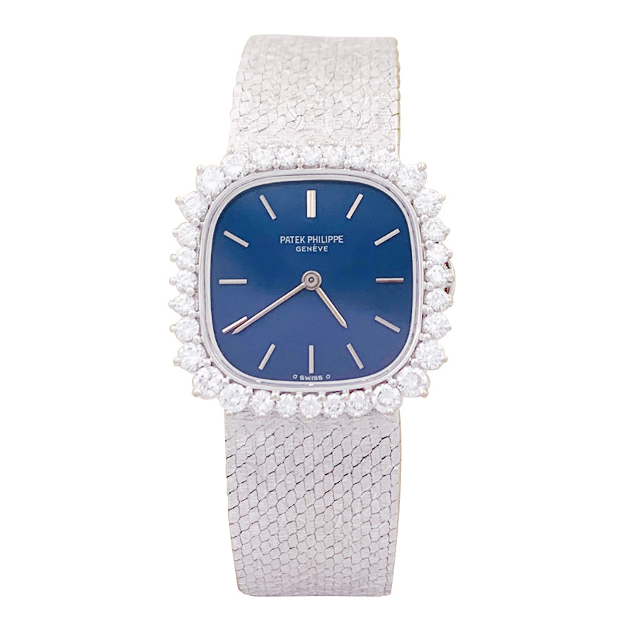 Montre Patek Philippe or blanc, diamants.
