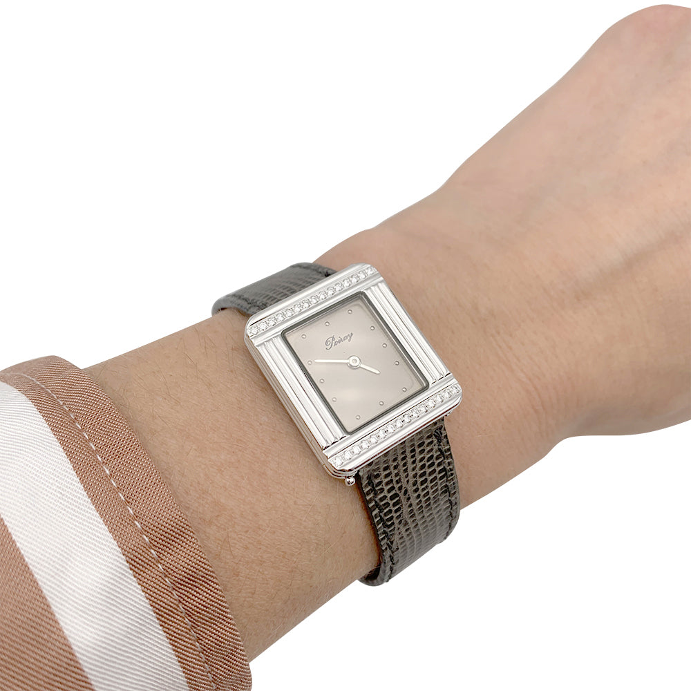 Poiray watch, "Ma Première", steel and diamonds on leather.