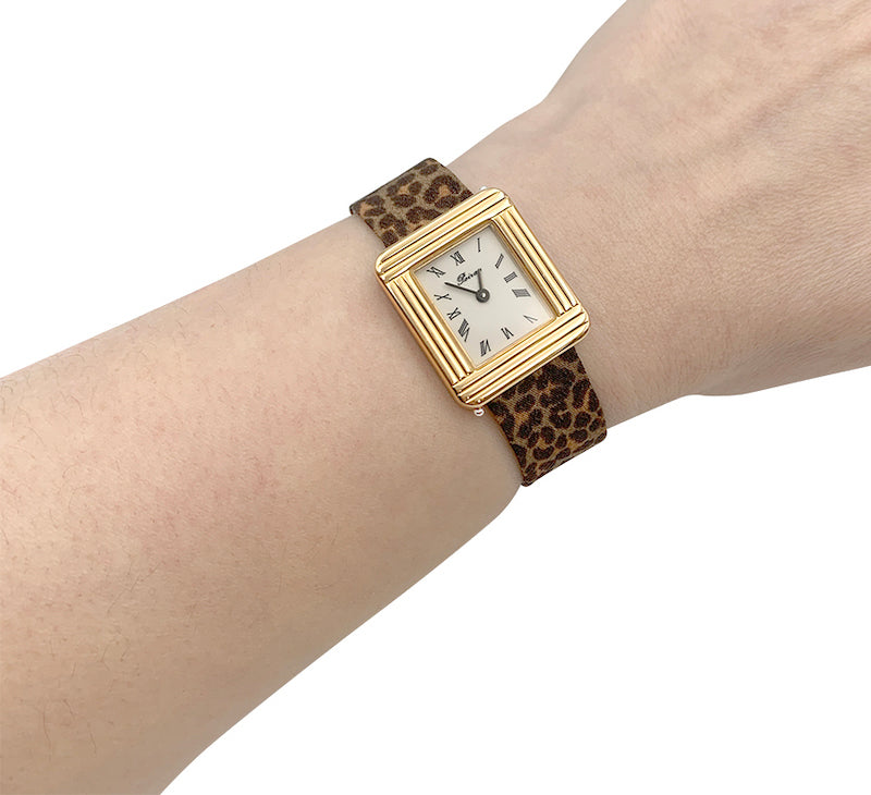 Montre Poiray, "Ma Première", plaqué or, acier.