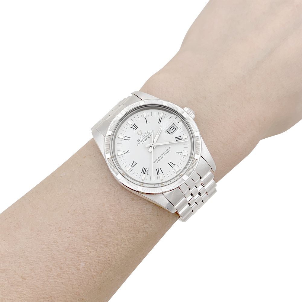 Rolex "Oyster Perpetual Date" steel watch.