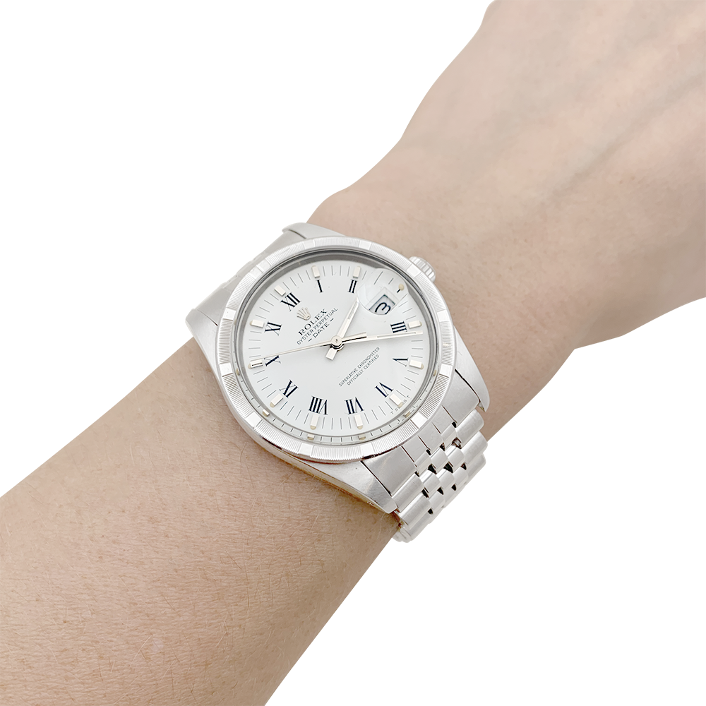 Rolex "Oyster Perpetual Date" steel watch.