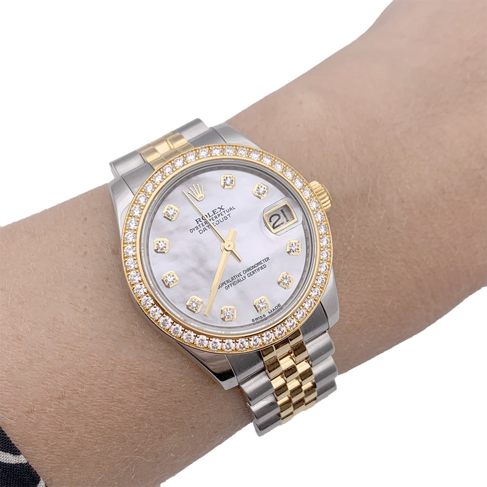 Rolex watch, "Oyster Perpetual Datejust", yellow gold, steel, mother-of-pearl and diamonds.